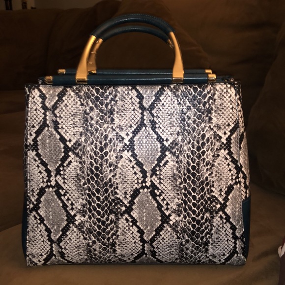 Blue, Gray and black snake skin print with gold handles and shoulder strap. - Picture 3 of 3